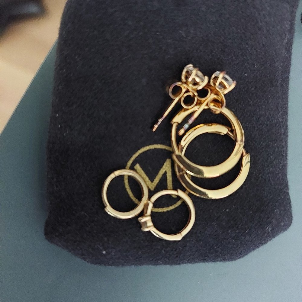 Assorted Mejuri earrings